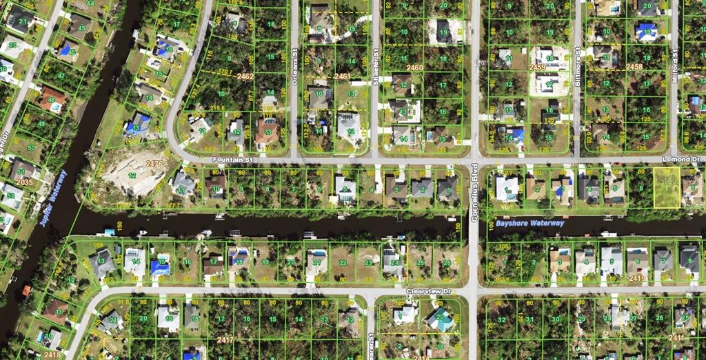 This is an aerial map showing residential lots and streets in a suburban neighborhood — 690 LOMOND DRIVE, PORT CHARLOTTE, FL