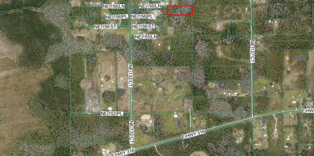 This is an aerial map showing property boundaries and road names in a rural area — TBD NE 156TH LANE, FORT MC COY, FL