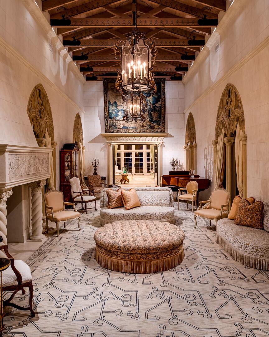 A grand living room features a vaulted wood ceiling, stone fireplace, and ornate chandeliers — 790 S County Road, Palm Beach FL 33480, PALM BEACH, FL