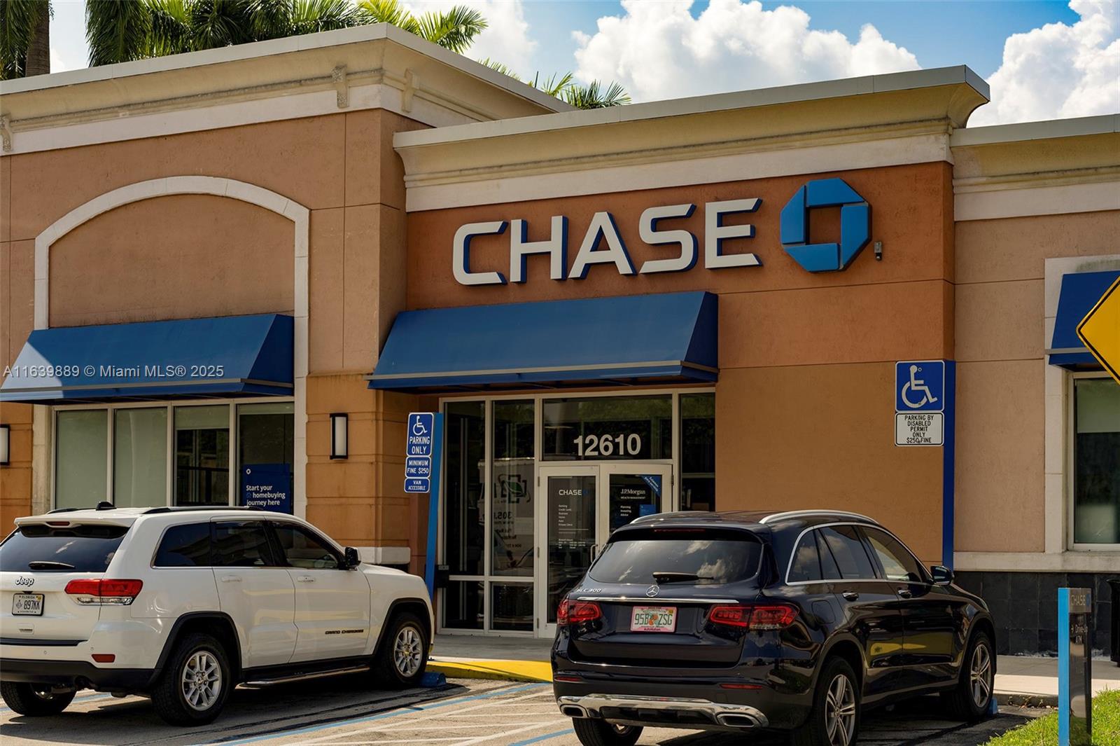 A Chase bank branch exterior with two cars parked in front of the entrance — 12610 SW 120th St, Miami FL 33186, MIAMI, FL