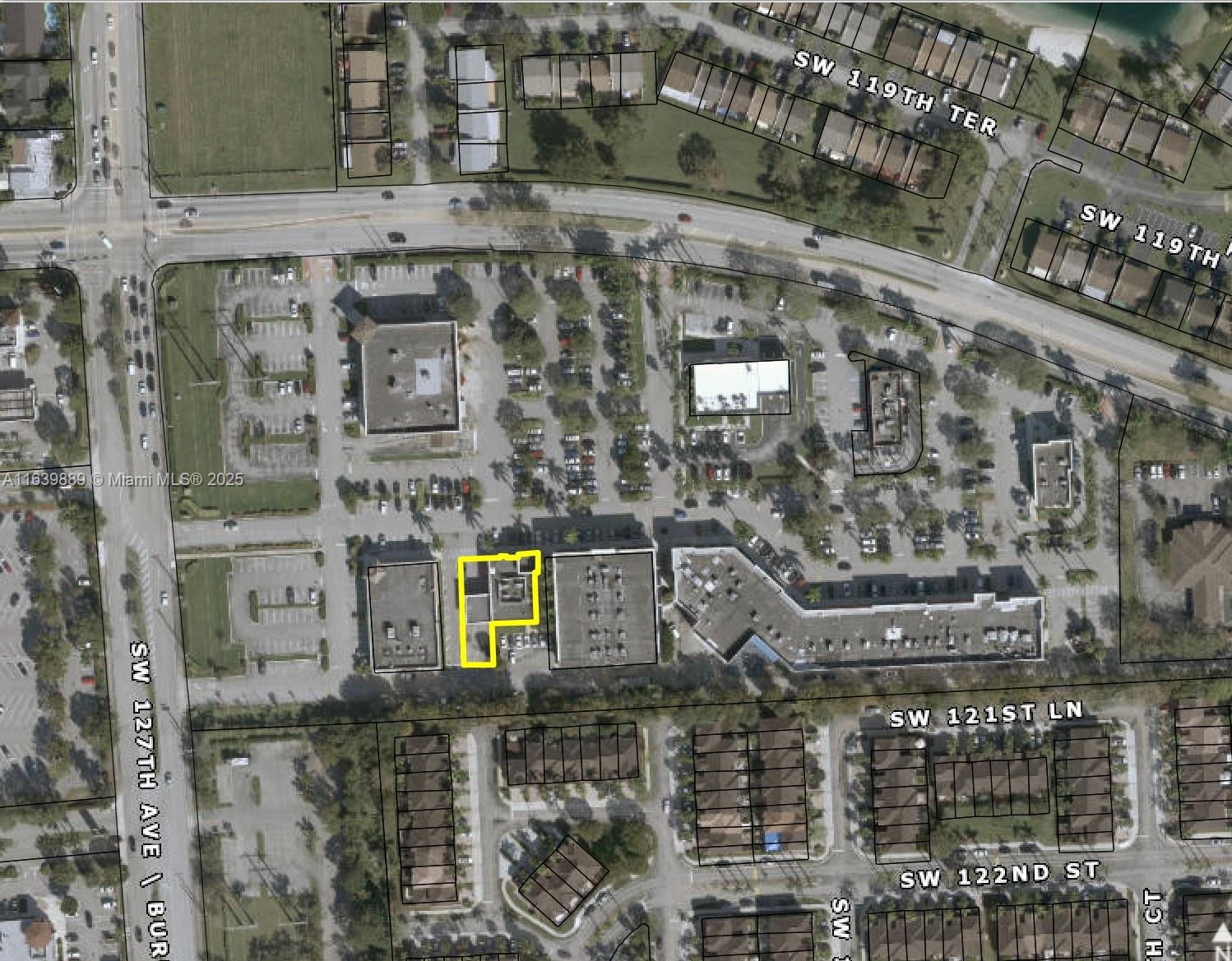 This is an aerial map showing a commercial building highlighted in yellow within a parking lot — 12610 SW 120th St, Miami FL 33186, MIAMI, FL