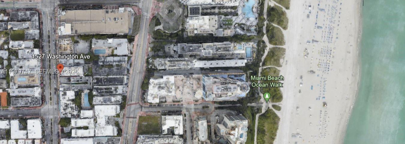This aerial map view shows a property location in relation to the beach and streets — 1527 Washington Ave, Miami Beach FL 33139, MIAMI BEACH, FL
