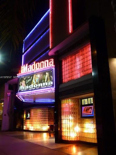 The exterior of a building at night features a neon sign for Madonna — 1527 Washington Ave, Miami Beach FL 33139, MIAMI BEACH, FL