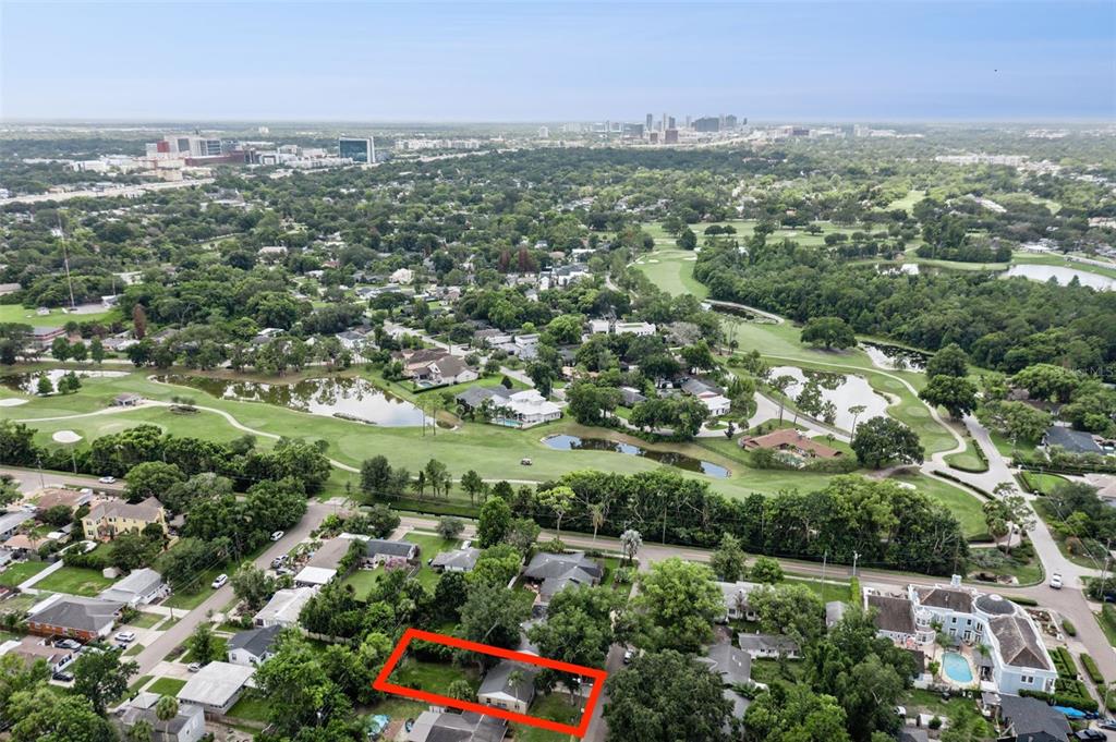 An aerial view shows a residential property outlined in red near a golf course — 846 DRIVER AVENUE, WINTER PARK, FL