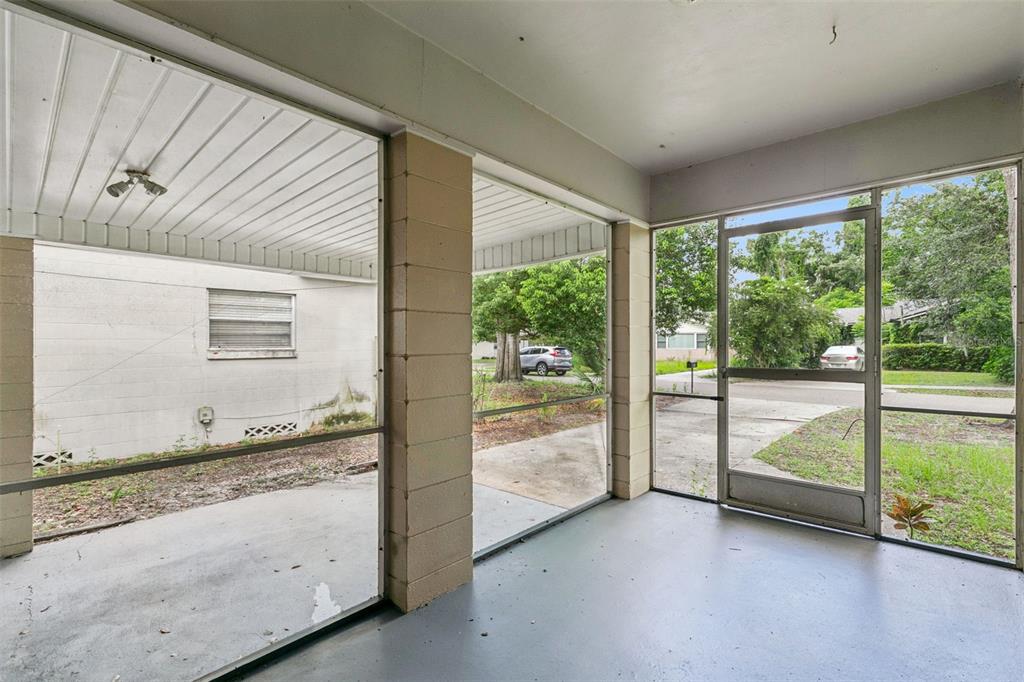 A screened-in porch with a concrete floor, block columns, and a view of the yard — 846 DRIVER AVENUE, WINTER PARK, FL