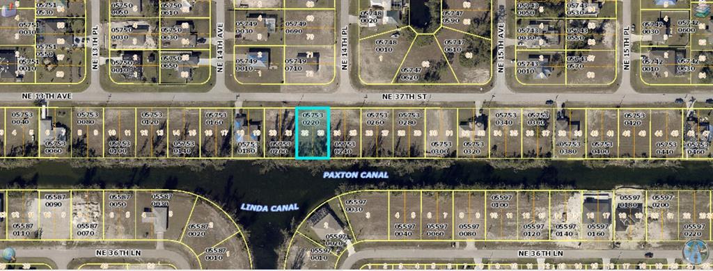 This is a satellite map showing a highlighted residential lot along a canal — 1408 NE 37TH STREET, CAPE CORAL, FL