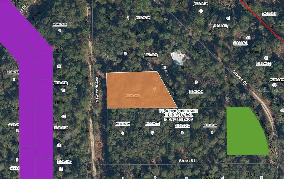 This is a map showing property parcel boundaries overlaid on an aerial view of land — 120 NEW YORK AVENUE, SATSUMA, FL