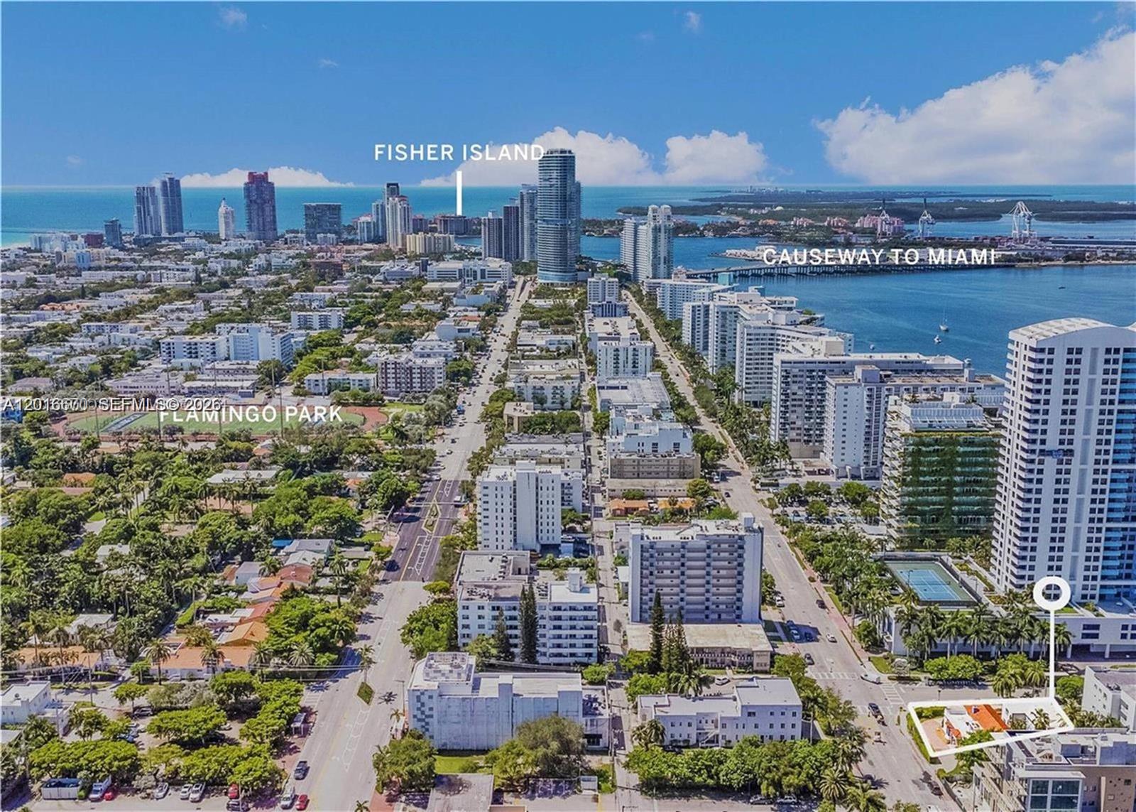 An aerial view shows a dense urban neighborhood with high-rise buildings, streets, and green spaces — 1315 14th St, Miami Beach FL 33139, MIAMI BEACH, FL
