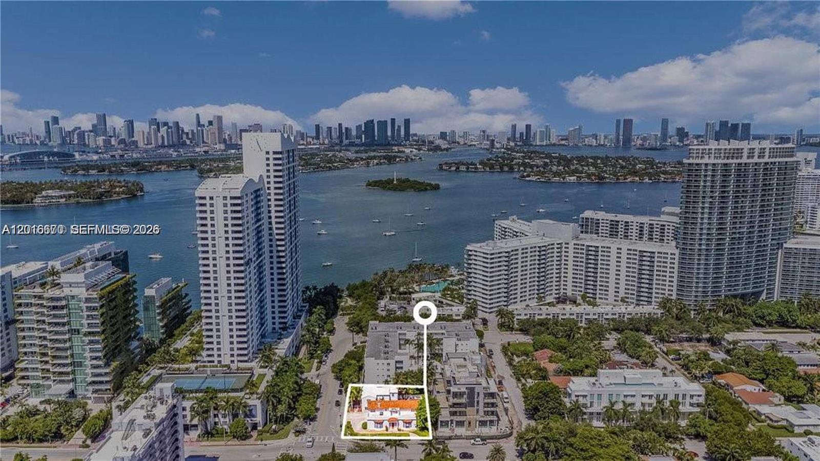 An aerial view shows a low-rise building highlighted in a white box near the waterfront — 1315 14th St, Miami Beach FL 33139, MIAMI BEACH, FL