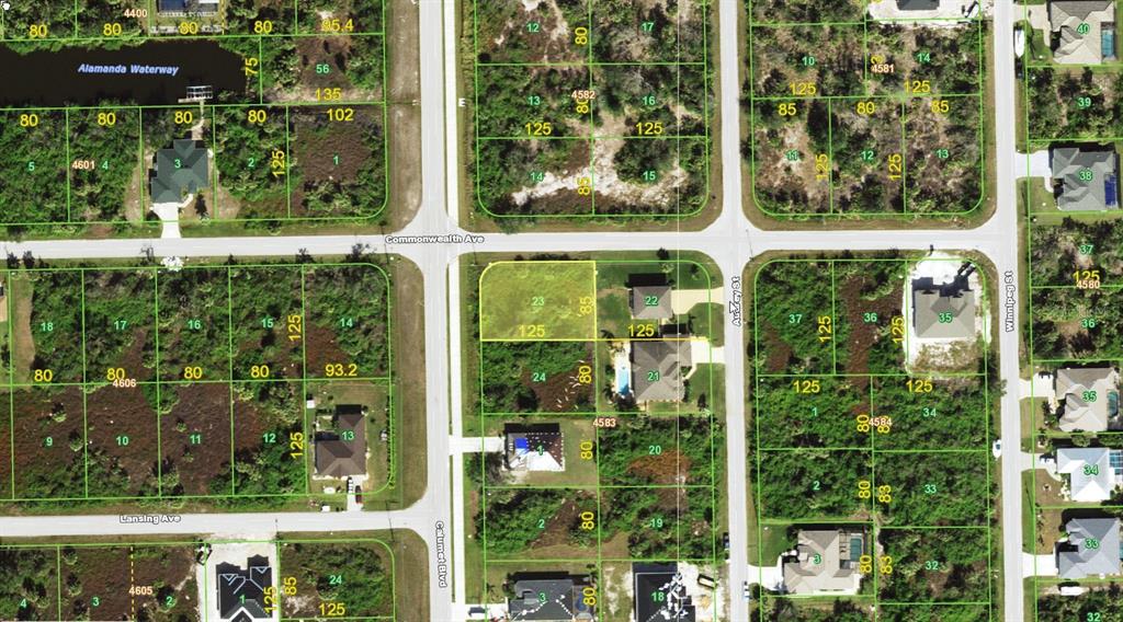 This is an aerial map showing residential lots, streets, and vegetation in a suburban neighborhood — 10044 CALUMET BOULEVARD, PORT CHARLOTTE, FL