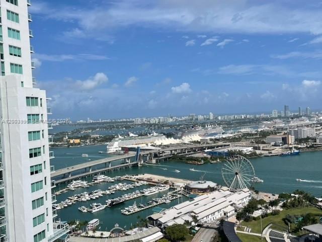 An elevated view shows a harbor with cruise ships, a bridge, and a Ferris wheel — 253 2nd St # 3807, Miami FL 33132, MIAMI, FL