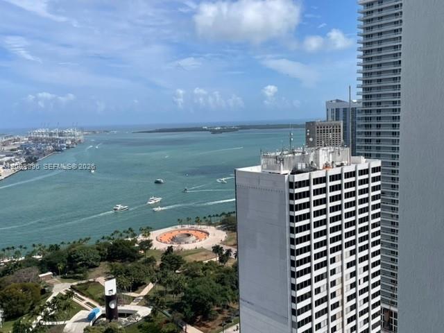 An elevated view shows a park, a bay with boats, and nearby high-rise buildings — 253 2nd St # 3807, Miami FL 33132, MIAMI, FL