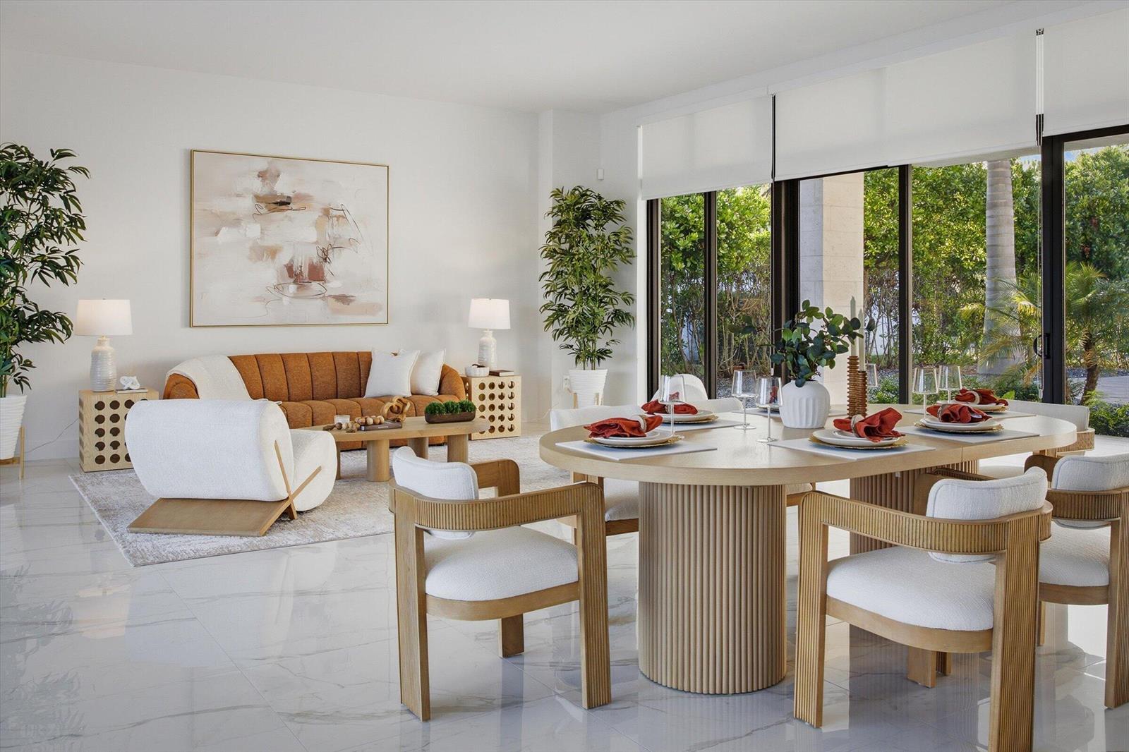 A bright open-concept living and dining area features modern furniture, neutral tones, and large windows — 16570 Sunset Way, Weston FL 33326, WESTON, FL