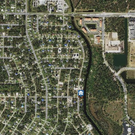 This is an aerial map showing a residential neighborhood with a highlighted property location — SADNET LANE, NORTH PORT, FL