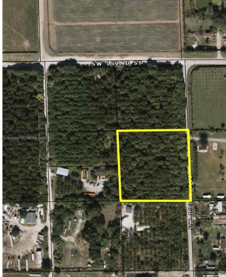 An aerial map view shows a rectangular, wooded plot of land outlined in yellow — 15300 SW 193, Kendall FL 33187, KENDALL, FL