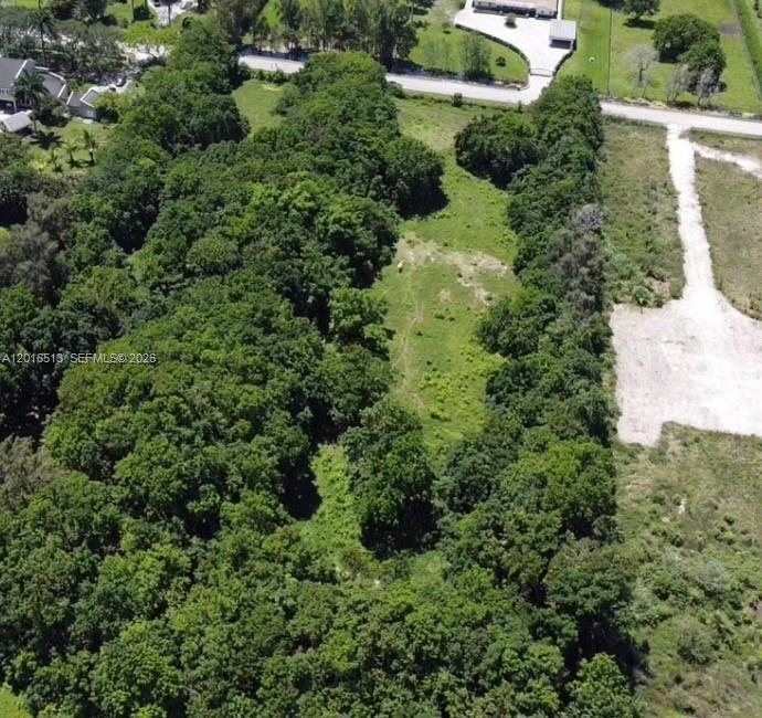 An aerial view shows a rectangular plot of land featuring dense trees and open grass — NA Luray Rd, Southwest Ranches FL 33330, SOUTHWEST RANCHES, FL