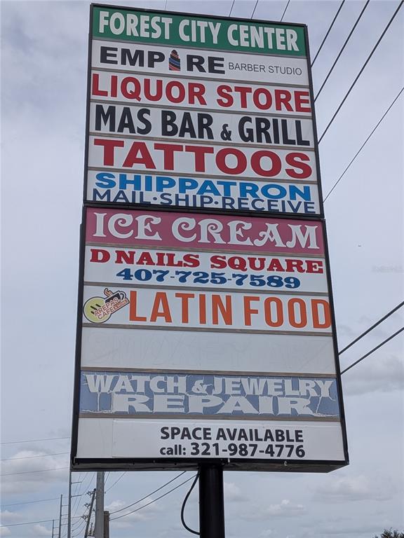 A tall, multi-tenant commercial sign lists various businesses at the Forest City Center — 1160 W STATE ROAD 436 UNIT 1150, ALTAMONTE SPRINGS, FL