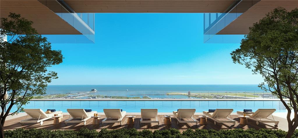 This architectural rendering shows a modern infinity pool overlooking a harbor and the ocean — 150 2ND AVENUE S UNIT 2804, ST PETERSBURG, FL