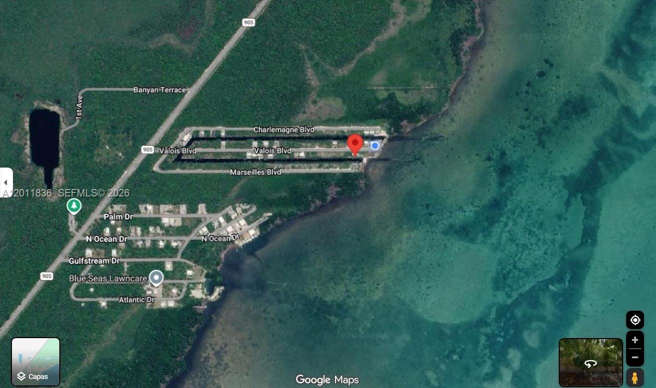 This is a satellite map view of a residential area near the water — 167 Valois Blvd, Key Largo FL 33037, KEY LARGO, FL