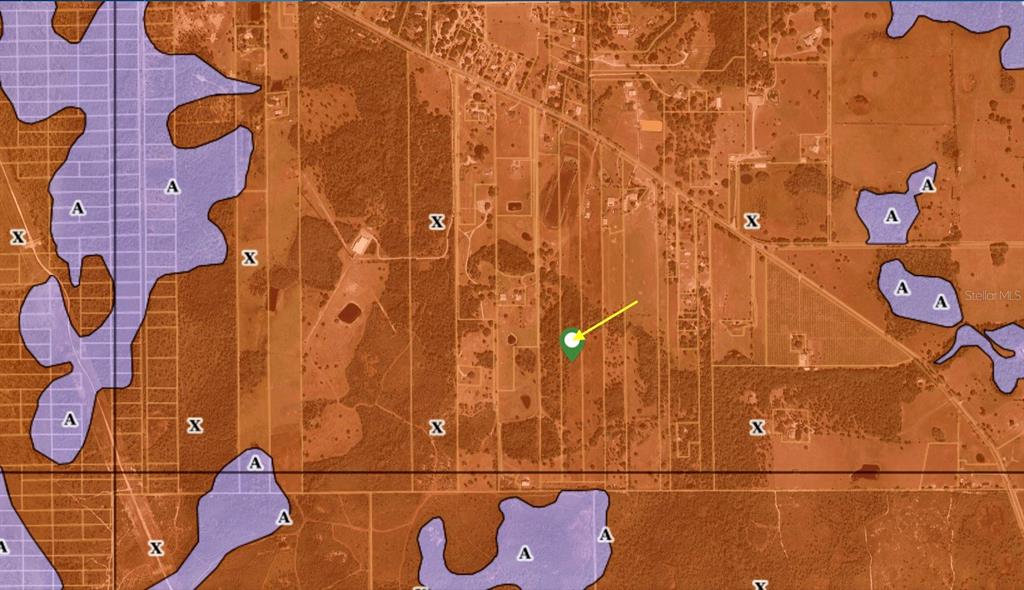 This is a flood zone map showing a property location marked with a green pin — LOT 9 FORT CHRISTMAS ROAD, CHRISTMAS, FL