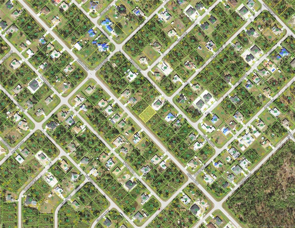 This is an aerial map showing residential lots and streets in a suburban neighborhood — 5528 GILLOT BOULEVARD, PORT CHARLOTTE, FL