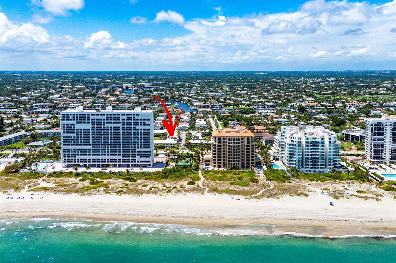 An aerial view of beachfront high-rise condominiums and surrounding residential properties along the coast — 930 Osceola Drive # 9, Boca Raton FL 33432, BOCA RATON, FL