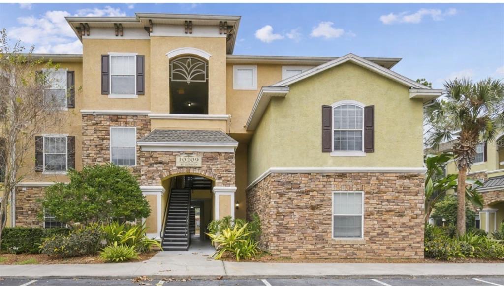 10209 COURTNEY PALMS BOULEVARD UNIT 101