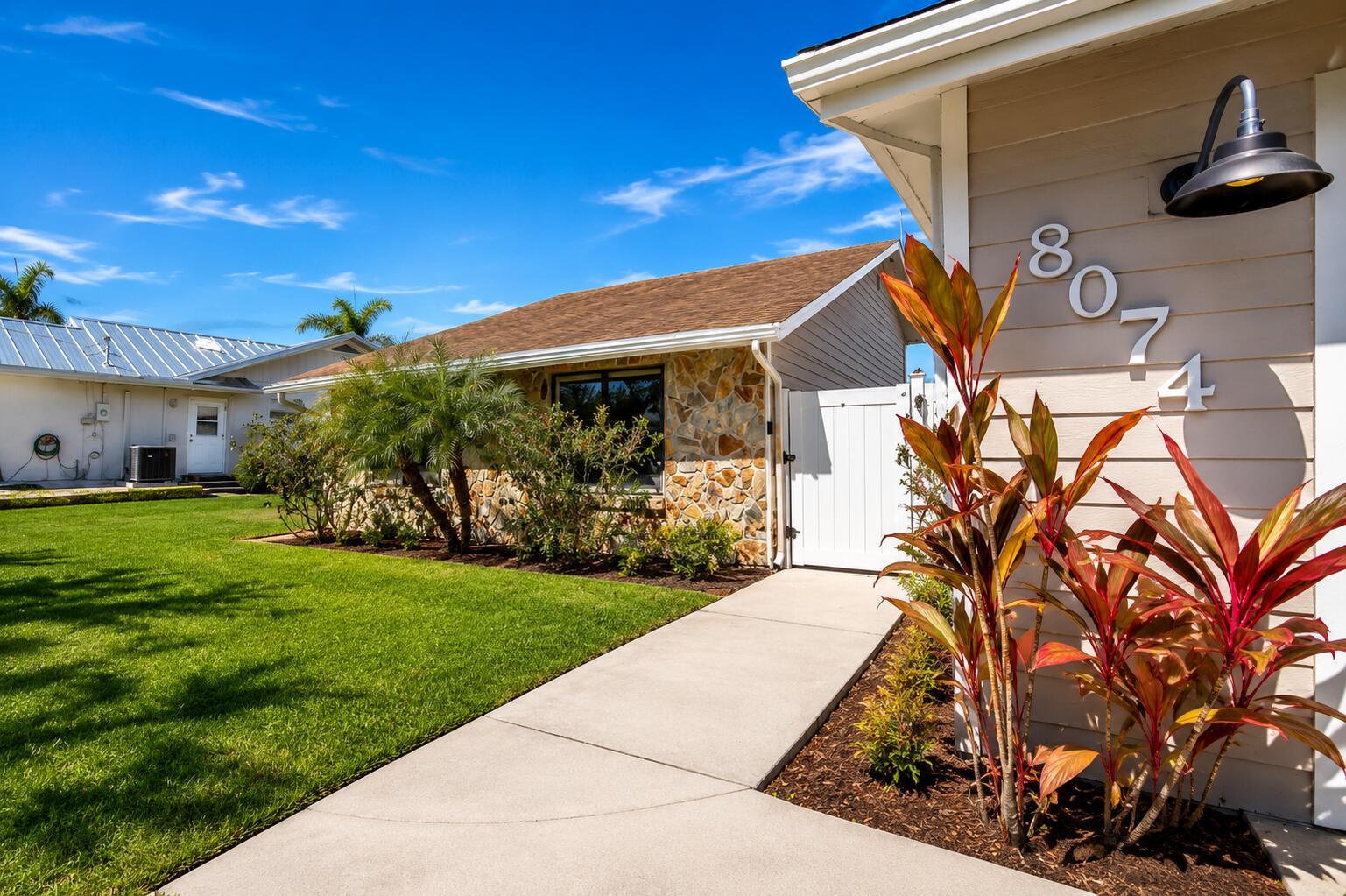 Front Exterior — 8074 SE River Lane, Stuart FL 34997, STUART, FL
