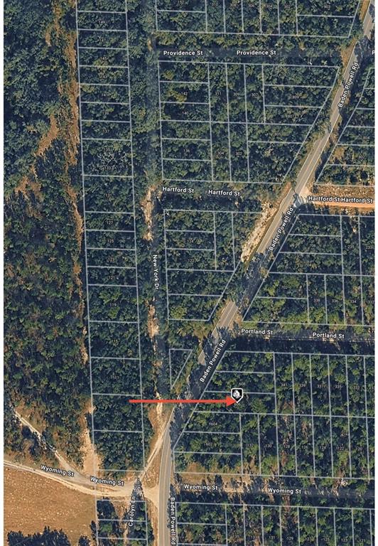 An aerial map view shows a residential lot marked with a pin near Baden Powell Road — 606 BADEN POWELL ROAD, HAWTHORNE, FL