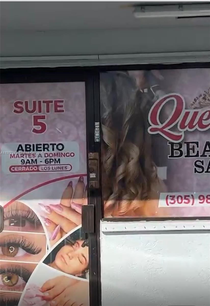 A glass door displays business hours and services for a beauty salon in Suite 5 — 3300 E 4 AVE, Hialeah FL 33013, HIALEAH, FL