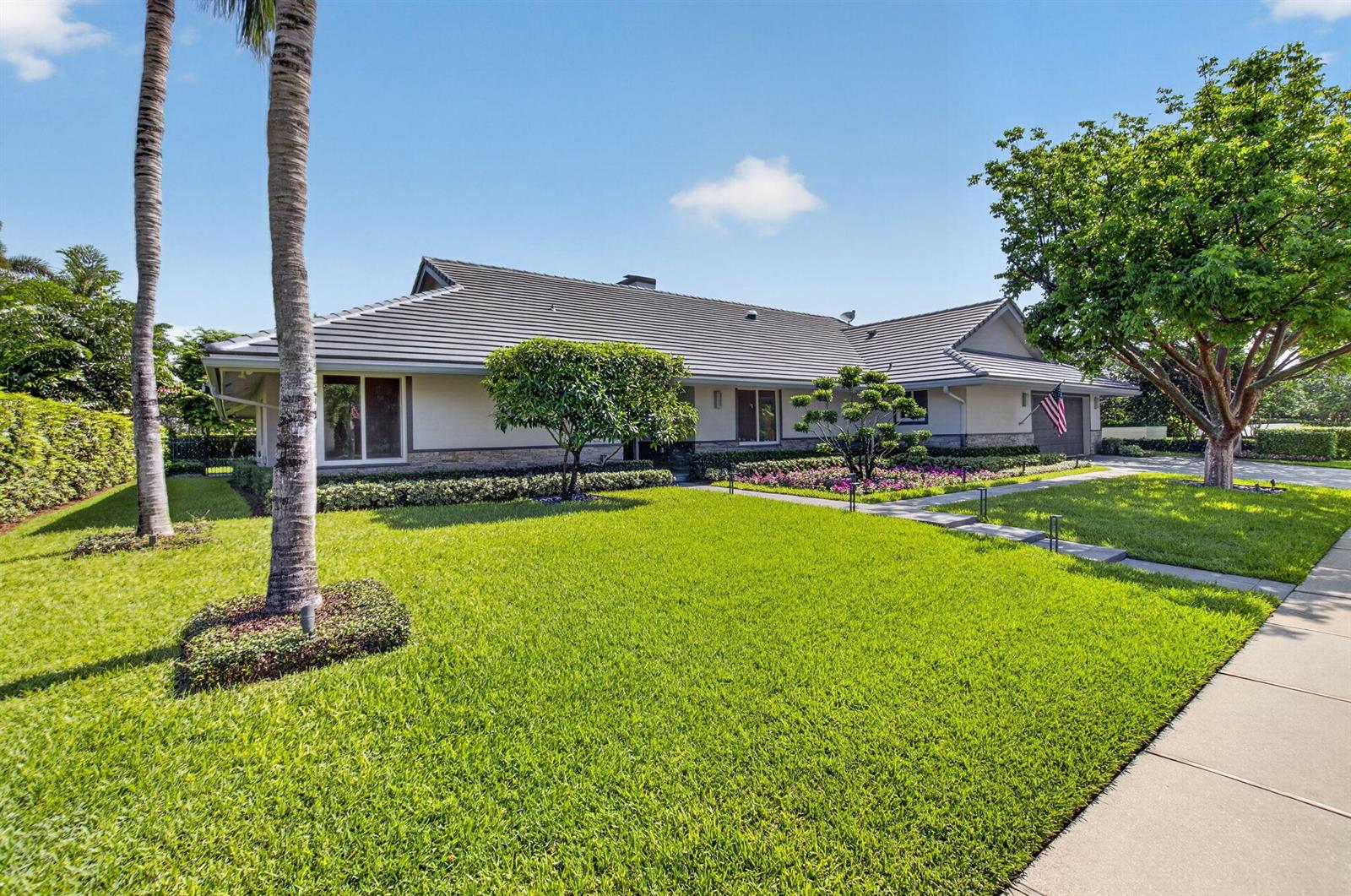 A single-story house with a gray tile roof, manicured lawn, and palm trees — 3245 St James Drive, Boca Raton FL 33434, BOCA RATON, FL