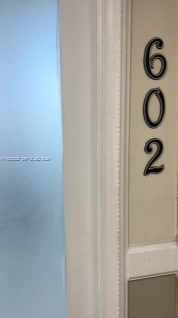 A close-up view of a door frame with the number 602 mounted vertically — 4445 W 16th Ave # 605, Hialeah FL 33012, HIALEAH, FL