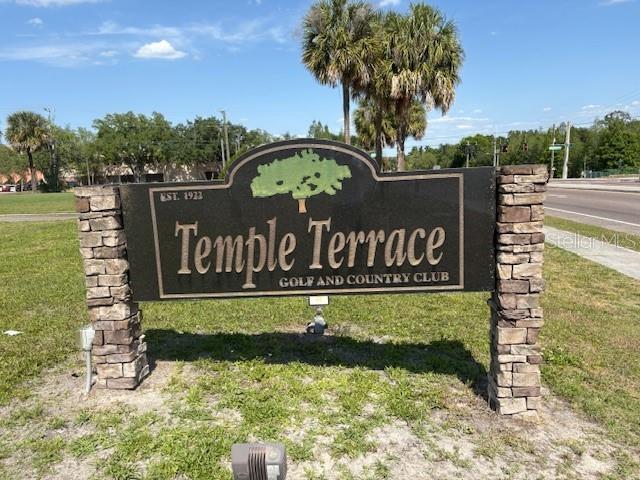 A stone-based sign for the Temple Terrace Golf and Country Club stands outdoors — 112 N LOCKMOOR AVENUE, TEMPLE TERRACE, FL