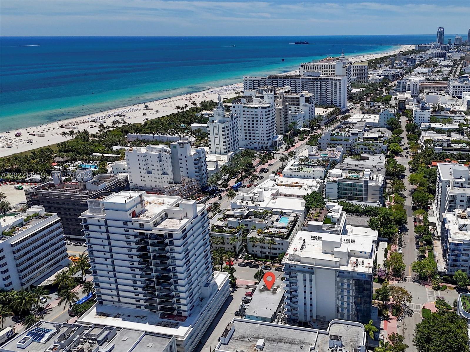 An aerial view shows a coastal city with high-rise buildings, a beach, and the ocean — 235 18th St, Miami Beach FL 33139, MIAMI BEACH, FL