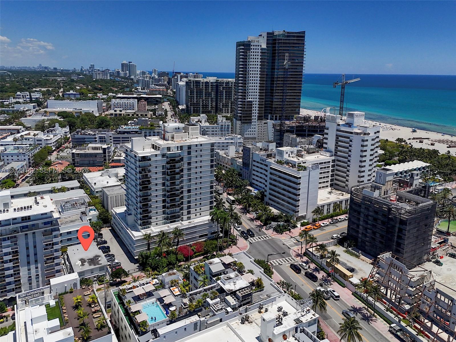 An aerial view of a coastal city featuring high-rise buildings, streets, and a beach — 235 18th St, Miami Beach FL 33139, MIAMI BEACH, FL