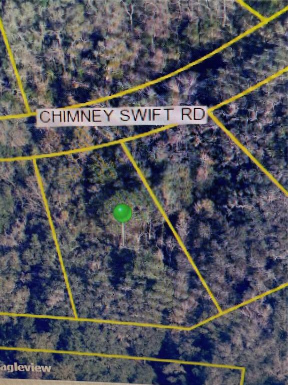 This is an aerial map view showing a plot of land on Chimney Swift Road — 14388 CHIMNEY SWIFT ROAD, WEEKI WACHEE, FL