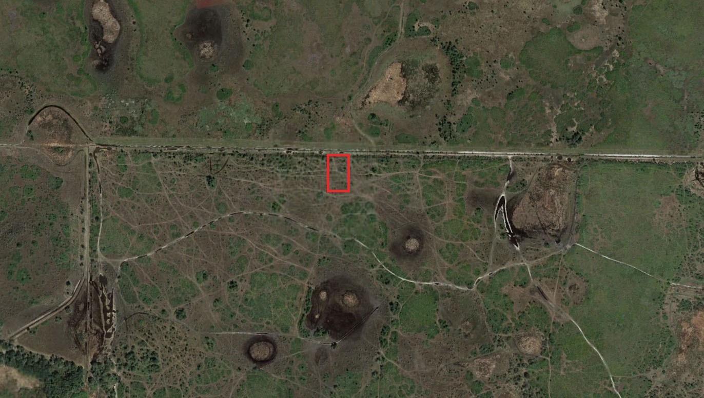 This is an aerial map view showing a rectangular plot of land outlined in red — 0 NW 320th Street, Okeechobee FL 34972, OKEECHOBEE, FL