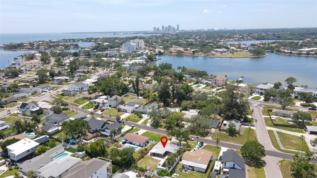 An aerial view shows a residential neighborhood with a red pin marking a specific house — 3727 ALABAMA AVENUE NE, ST PETERSBURG, FL
