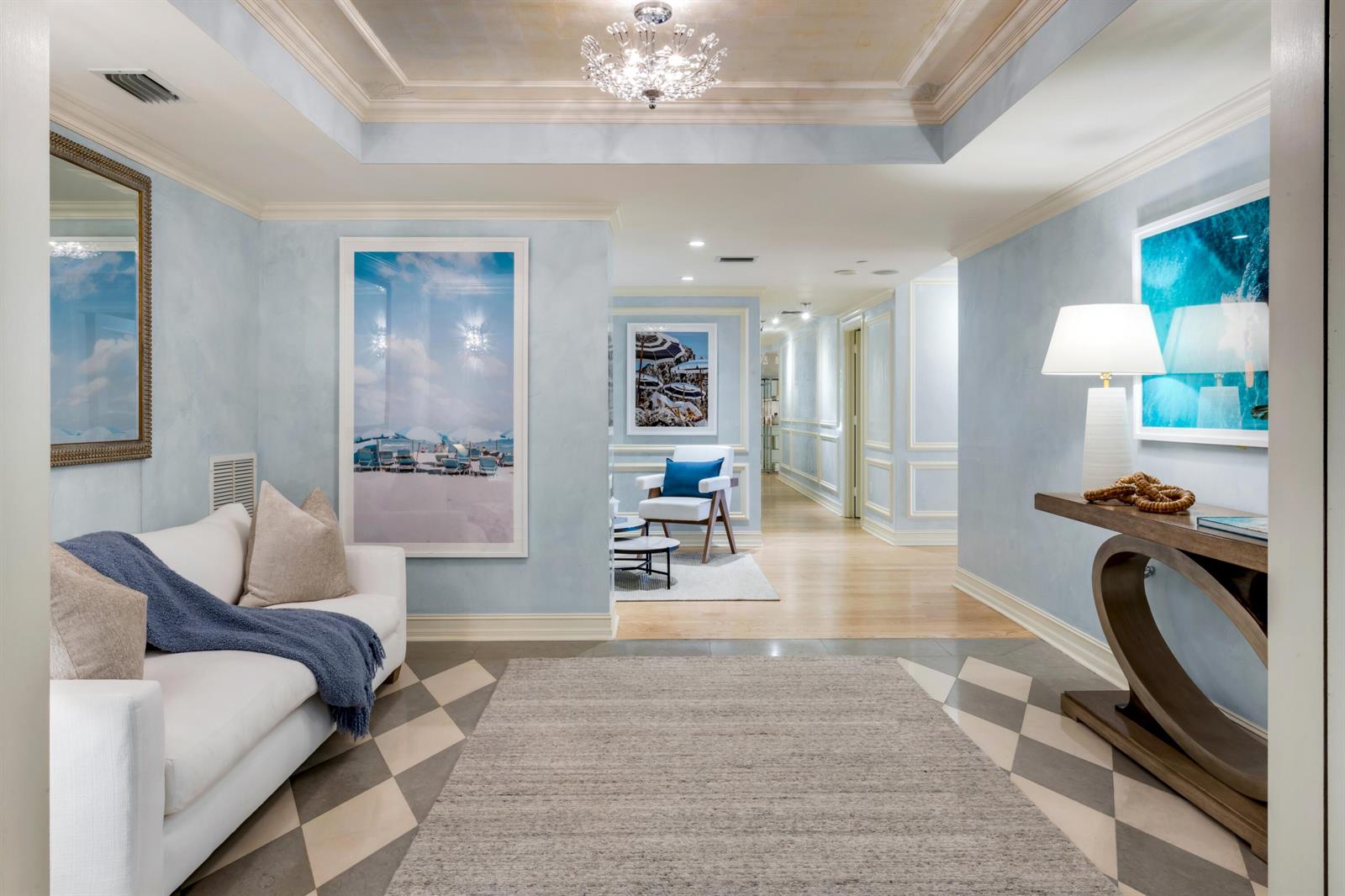 A light blue foyer features a white sofa, a console table, and checkered tile flooring — 400 S Ocean Boulevard # 26, Boca Raton FL 33432, BOCA RATON, FL