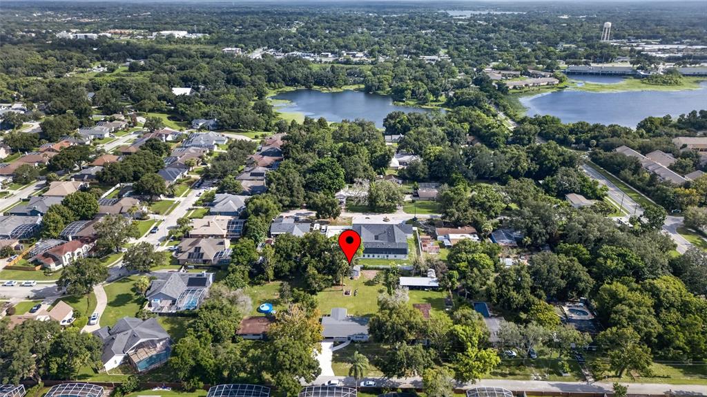 This aerial view shows a residential neighborhood with a red location pin over a house — 1146 DONALD AVENUE, ALTAMONTE SPRINGS, FL