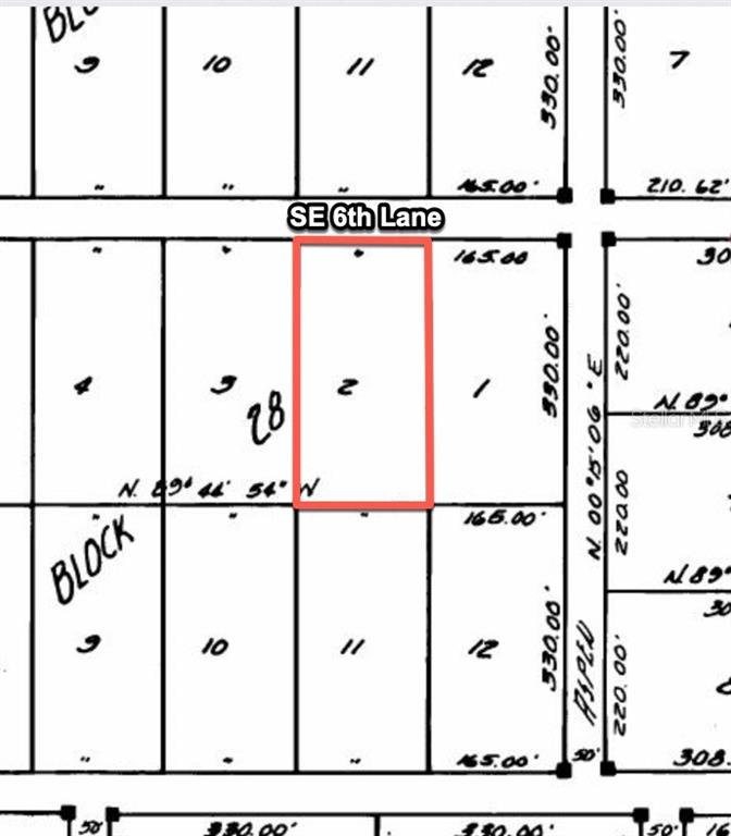 This is a plat map showing a rectangular parcel of land highlighted in red — 14710 SE 6TH LANE, WILLISTON, FL