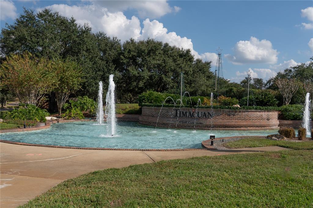 A brick wall with the name Timacuan sits behind a fountain in a landscaped area — 552 TETON STREET, LAKE MARY, FL