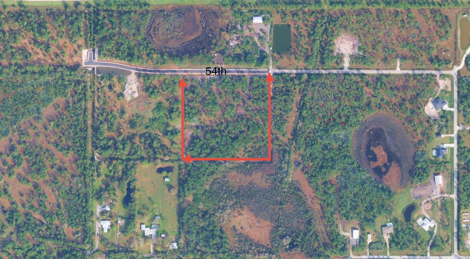 An aerial map view shows a rectangular plot of land outlined in red along 54th — 000 54th, Palm City FL 34990, PALM CITY, FL