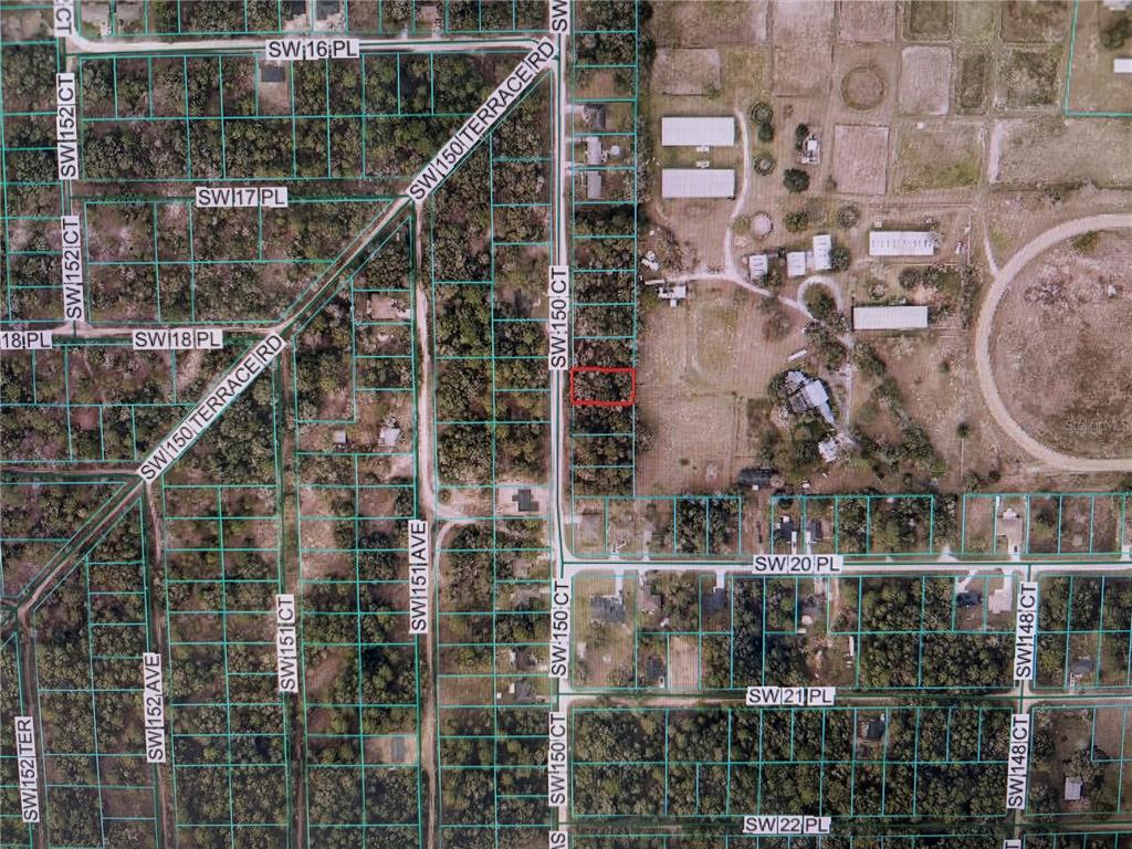 This is an aerial map showing a vacant lot outlined in red among residential streets — 1781 SW 150TH COURT, OCALA, FL
