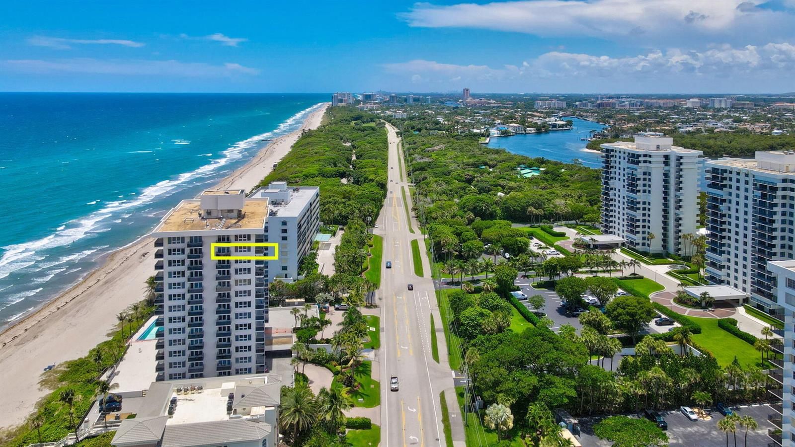 An aerial view of a coastal high-rise building with a yellow box highlighting a balcony — 2066 N Ocean Boulevard, Boca Raton FL 33431, BOCA RATON, FL