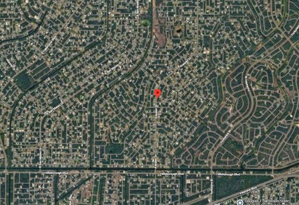 This is a satellite map view showing a residential neighborhood with a red location pin — Lot 3 ATWATER DRIVE, NORTH PORT, FL