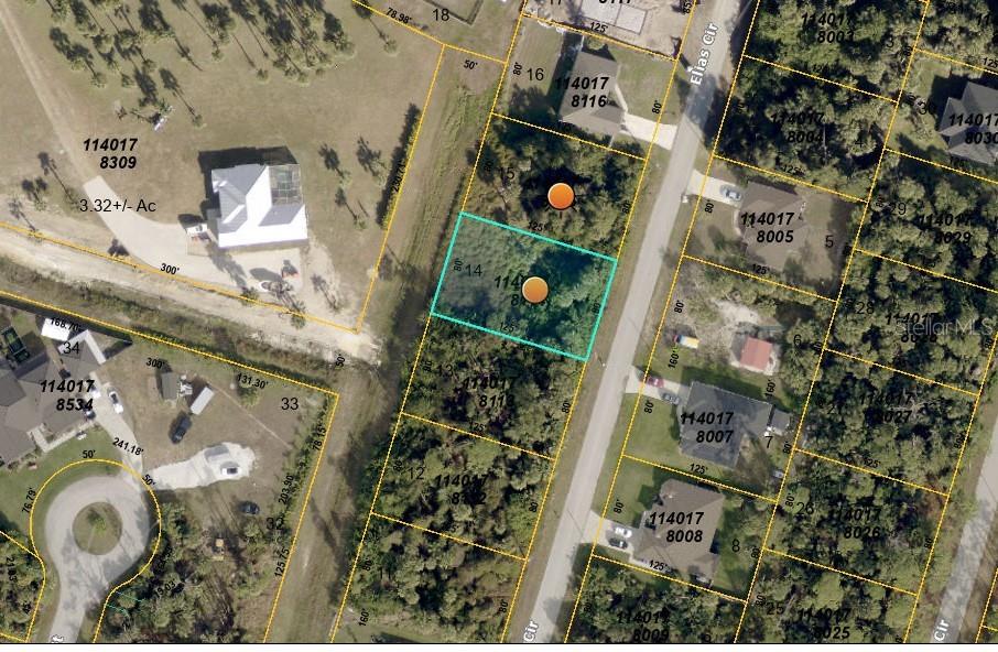 This is an aerial map showing a vacant, rectangular residential lot highlighted in blue — ELIAS CIRCLE, NORTH PORT, FL