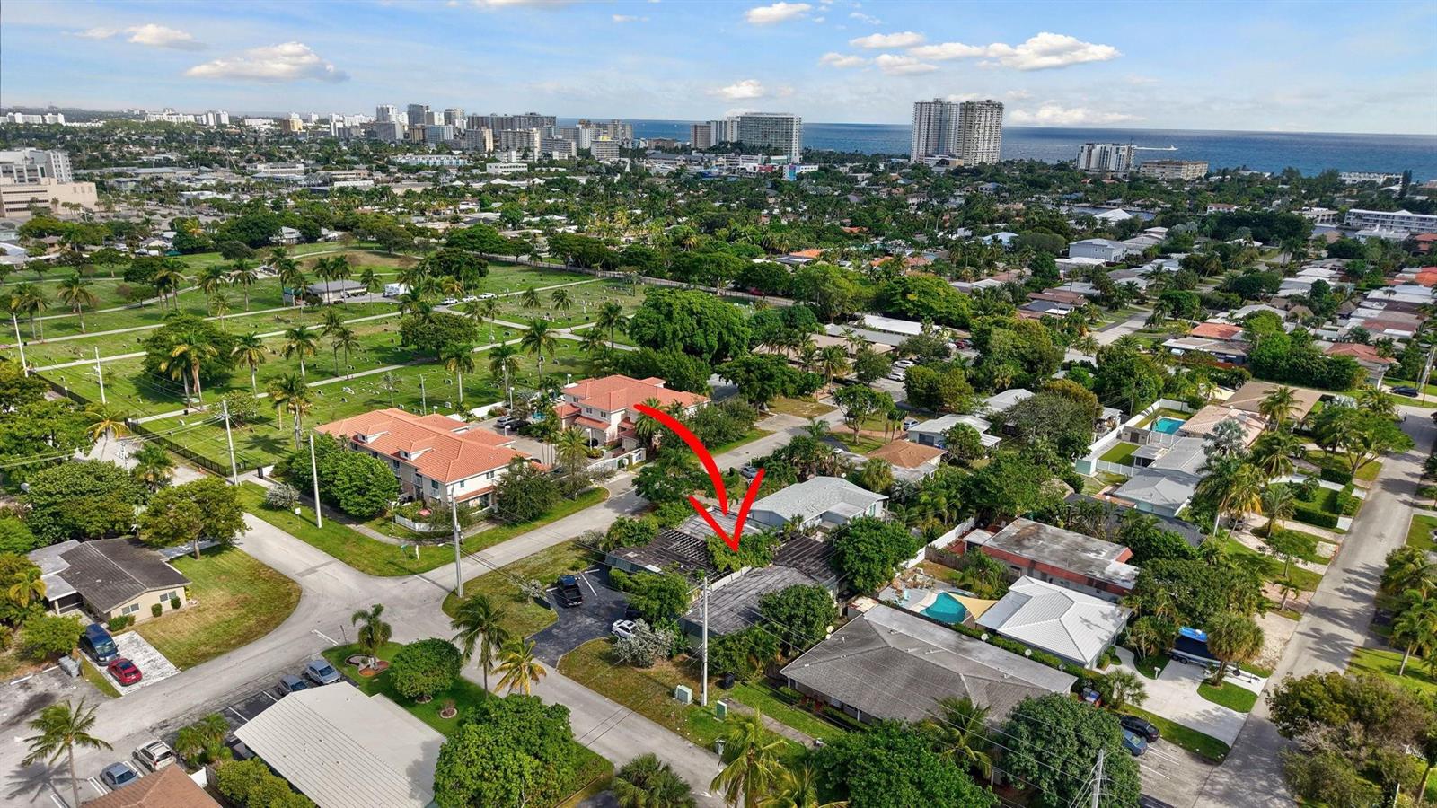 An aerial view shows a single-story house with a flat roof and a red arrow — 500 SE 23rd Avenue, Pompano Beach FL 33062, POMPANO BEACH, FL