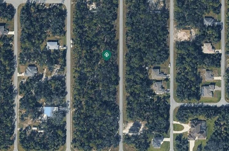 This is an aerial map view of a wooded residential lot marked with a pin — 279 JUPER STREET, PORT CHARLOTTE, FL