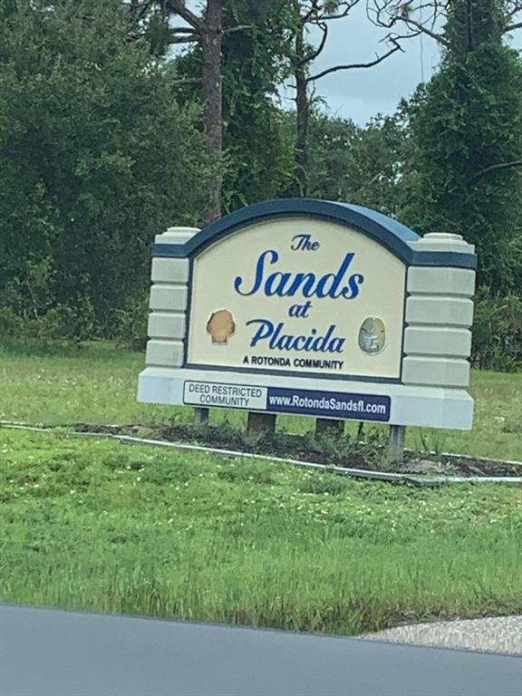 A sign for The Sands at Placida community stands on a grassy lawn — 6 AFT COURT, PLACIDA, FL